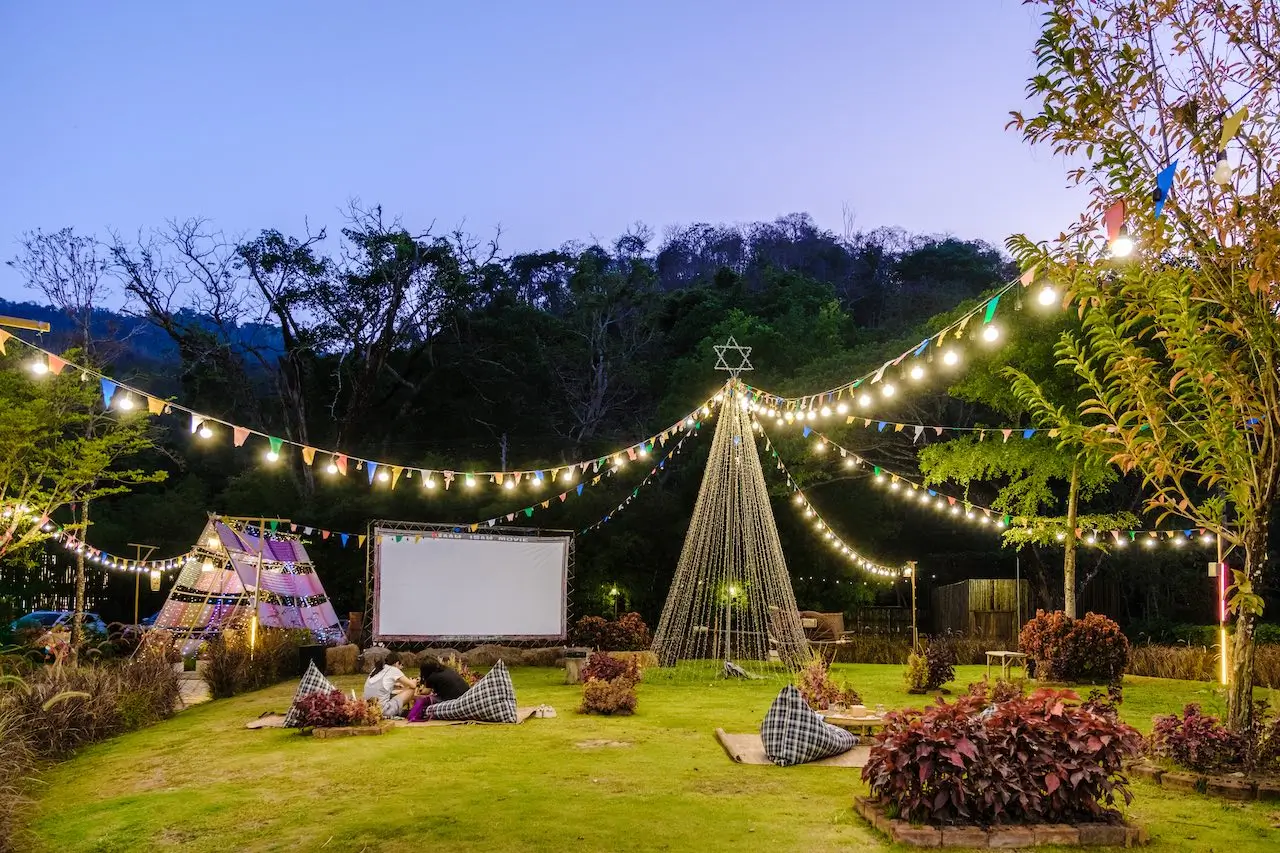 outdoor cinema film in a tropical garden with chri 2023 11 27 05 30 30 utc